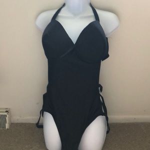 NWOT One Piece String Swim Suit.